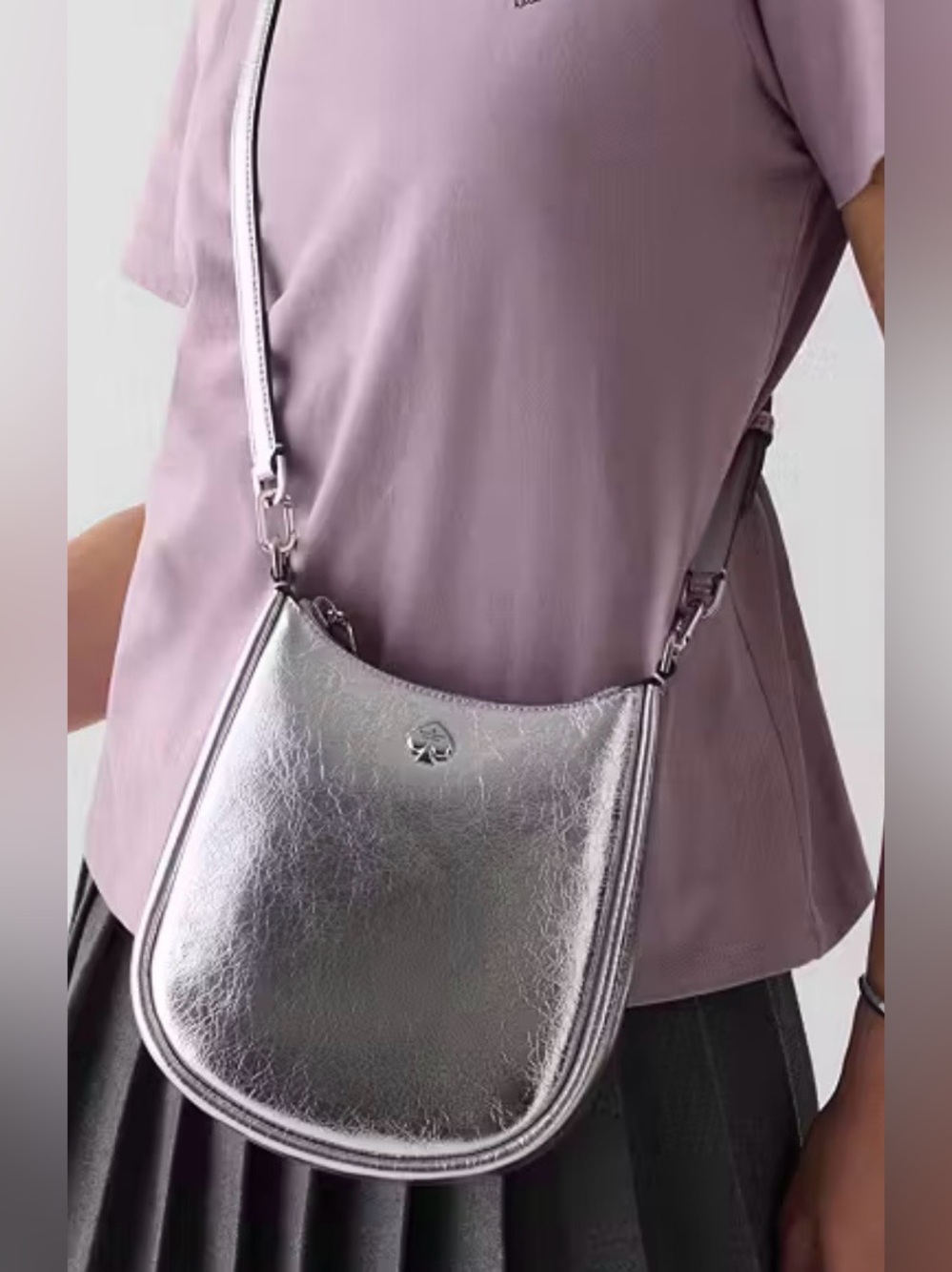 Kate Spade Kayla Small Swingpack Crossbody Bag in On Trend Metallic Silver. NWT